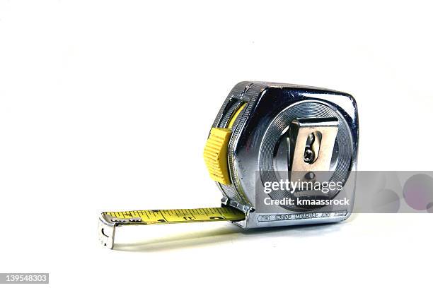 costruzione: metro a nastro - pollice sistema metrico anglosassone foto e immagini stock