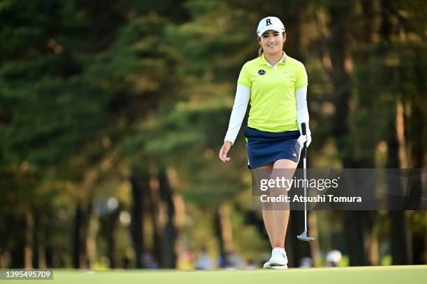 Mone Inami of Japan reacts after a putt on the 9th green during the first round of World Ladies Championship Salonpas Cup at Ibaraki Golf Club on May...
