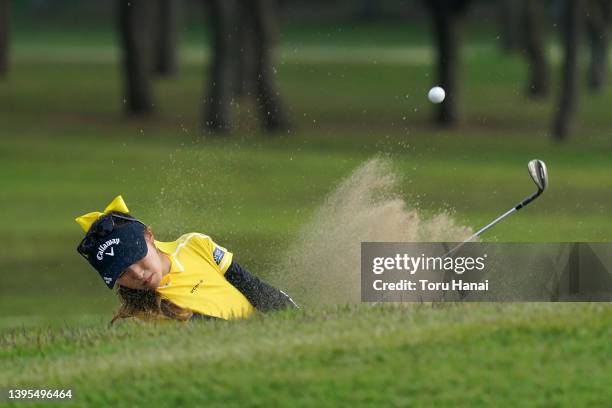 Reika Usui of Japan hits out from a bunker on the 9th hole during the first round of World Ladies Championship Salonpas Cup at Ibaraki Golf Club on...