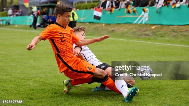 Diany Bierstekers of the Netherlands challenges Kelvin Kunstmann of Gerrmany during the International friendly match between Germany U15 and...