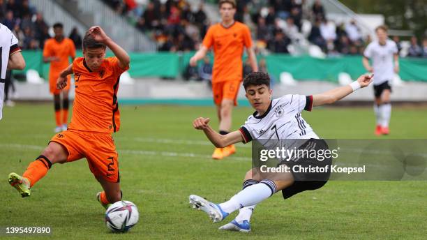 Diany Bierstekers of the Netherlands blocks a sho0t of Adin Licina of Gerrmanyduring the International friendly match between Germany U15 and...