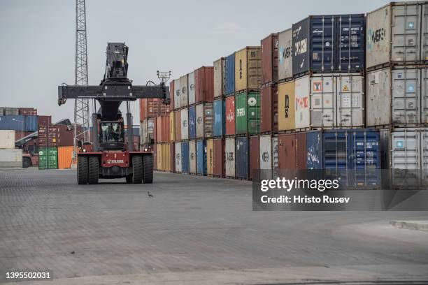 Crane truck passes by container yard in the Port of Varna West on May 5, 2022 in Varna, Bulgaria. Bulgaria's parliament voted and pledged to provide...