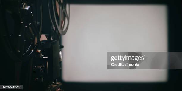 old cinema projector - film screening stockfoto's en -beelden