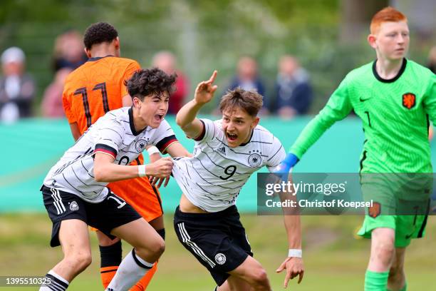 Cenny Neumann of Gerrmany celebrates the first goal and 1-0 with Taycan Etcibasi of Gerrmany during the International friendly match between Germany...