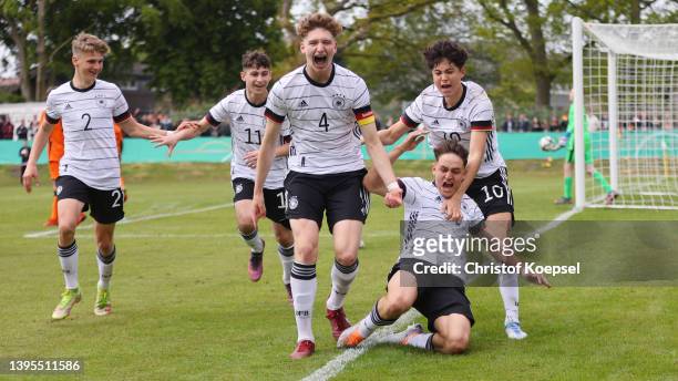 Cenny Neumann of Germany celebrates the first goal and 1-0 with his team mates during the International friendly match between Germany U15 and...