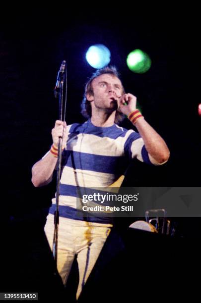 Phil Collins of English rock band Genesis performs on stage on their 'A Midsummer Night's Dream' concert on June 24th, 1978 at Knebworth, Herts,...