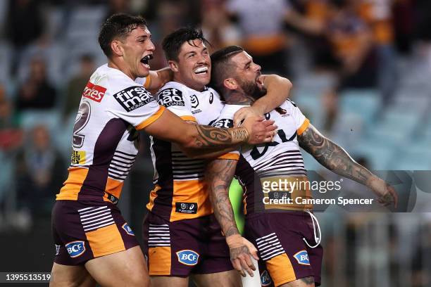 Adam Reynolds of the Broncos celebrates scoring a try during the round nine NRL match between the South Sydney Rabbitohs and the Brisbane Broncos at...