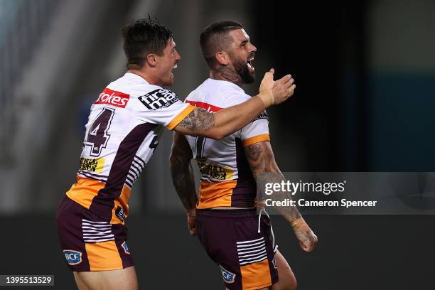 Adam Reynolds of the Broncos celebrates scoring a try during the round nine NRL match between the South Sydney Rabbitohs and the Brisbane Broncos at...