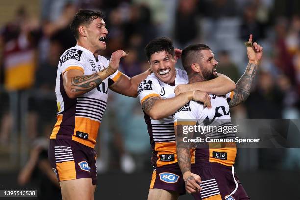 Adam Reynolds of the Broncos celebrates scoring a try during the round nine NRL match between the South Sydney Rabbitohs and the Brisbane Broncos at...