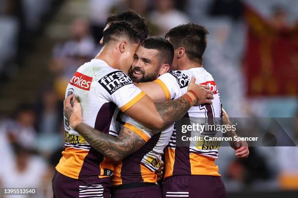 Adam Reynolds of the Broncos celebrates scoring a try during the round nine NRL match between the South Sydney Rabbitohs and the Brisbane Broncos at...