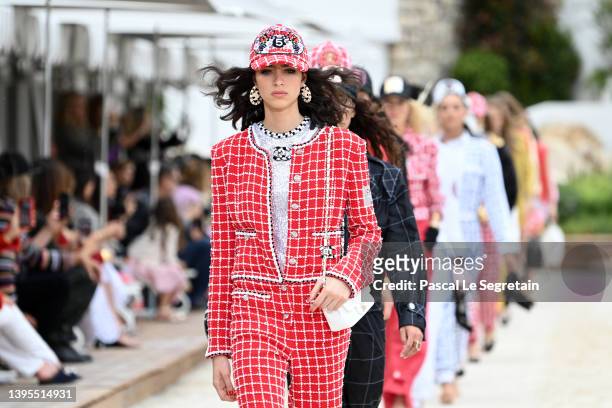 Models walk the runway during the Chanel Cruise 2023 Collection on May 05, 2022 in Monte-Carlo, Monaco.