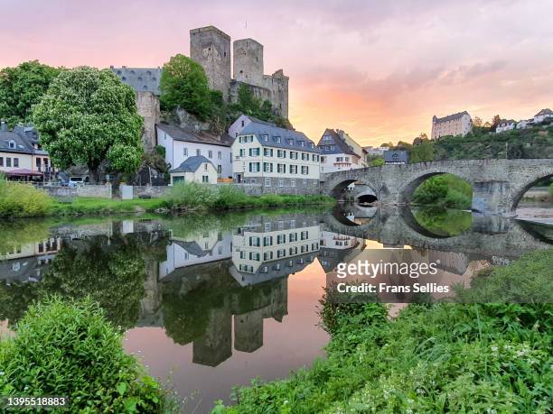 runkel castle and old stone bridge across the lahn river in runkel, hesse, germany - hesse germany stock pictures, royalty-free photos & images