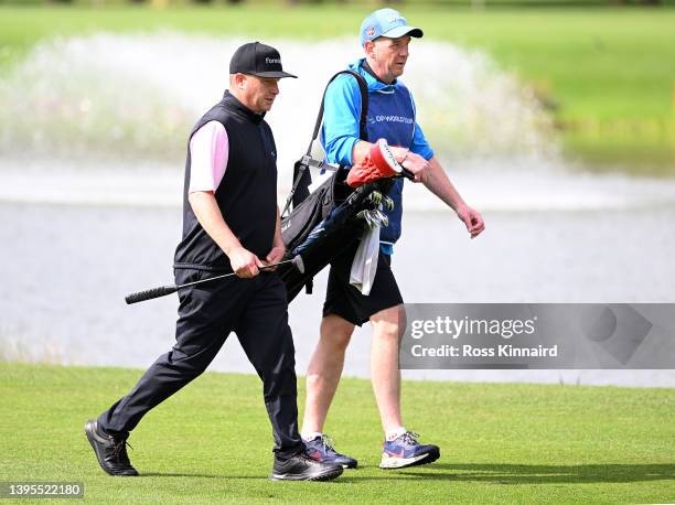 Greig Hutcheon of Scotland walks down the sixth hole during the first round of the Betfred British Masters hosted by Danny Willett at The Belfry on...