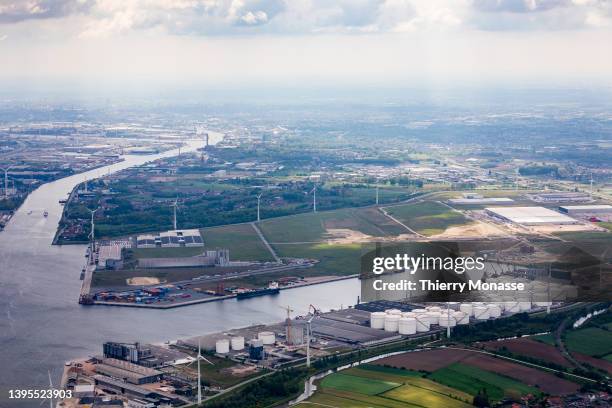 The Kluizendok liquids storage terminal, operated by 'Ghent Transport & Storage' is seen from the porthole of a plane on April 30, 2022 in Belgium....