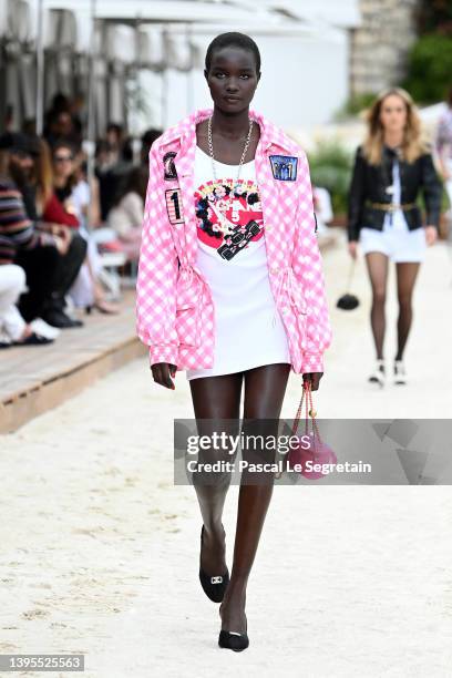 Model walks the runway during the Chanel Cruise 2023 Collection on May 05, 2022 in Monte-Carlo, Monaco.