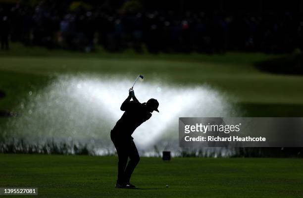 Ross Fisher of England plays his second shot on the 18th hole during the first round of the Betfred British Masters hosted by Danny Willett at The...