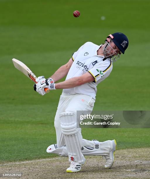 Dom Sibley of Warwickshire avoids a short ball from Luke Wood of Lancashire during the LV= Insurance County Championship match between Lancashire and...