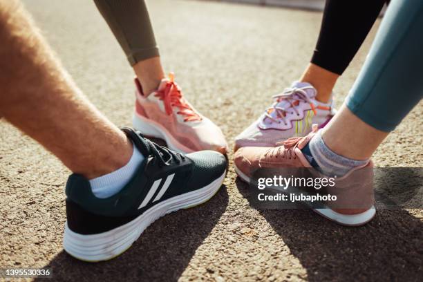 legs of sport people - 16 feet stock pictures, royalty-free photos & images
