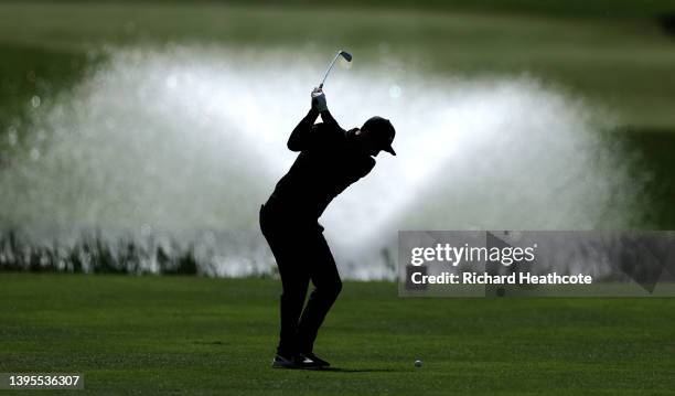 Ross Fisher of England plays his second shot on the 18th hole during the first round of the Betfred British Masters hosted by Danny Willett at The...