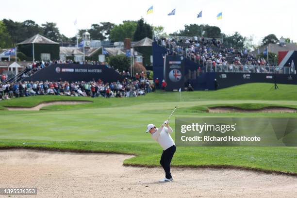 Robert MacIntyre of Scotland plays his second shot on the ninth hole during the first round of the Betfred British Masters hosted by Danny Willett at...