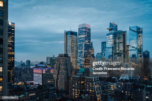 blue hour over hudson yards skyscrapers, high point of view. new york city, usa - nyc nightlife stock pictures, royalty-free photos & images