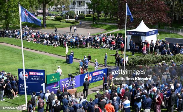 Richard Bland of England acknowledges the crowd on the first tee during the first round of the Betfred British Masters hosted by Danny Willett at The...