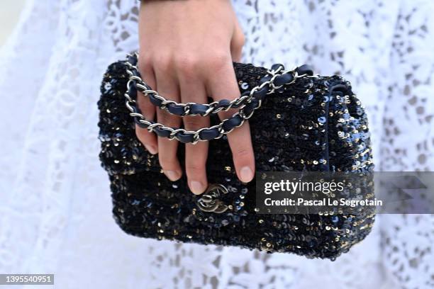 Model, bag detail walks the runway during the Chanel Cruise 2023 Collection on May 05, 2022 in Monte-Carlo, Monaco.