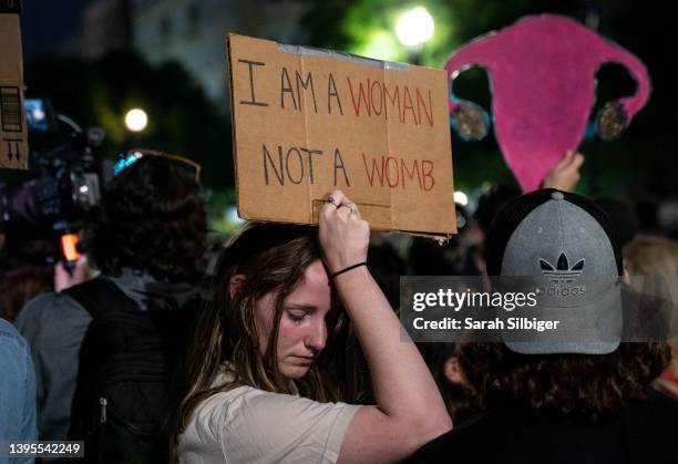 Abortion-rights advocates demonstrate into the night outside of the Supreme Court Building on May 4, 2022 in Washington, DC. Demonstrations across...