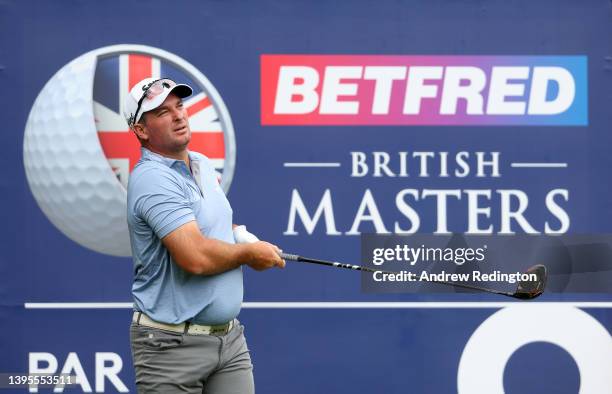 Ryan Fox of New Zealand tees off on the ninth hole during the first round of the Betfred British Masters hosted by Danny Willett at The Belfry on May...