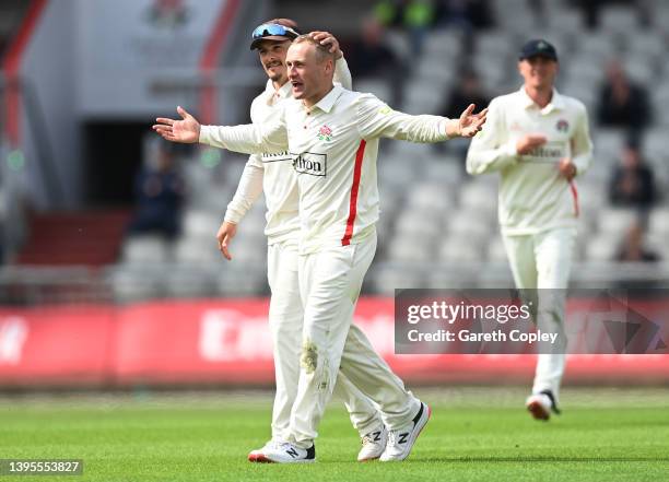 Matt Parkinson of Lancashire celebrates dismissing Will Rhodes of Warwickshire during the LV= Insurance County Championship match between Lancashire...