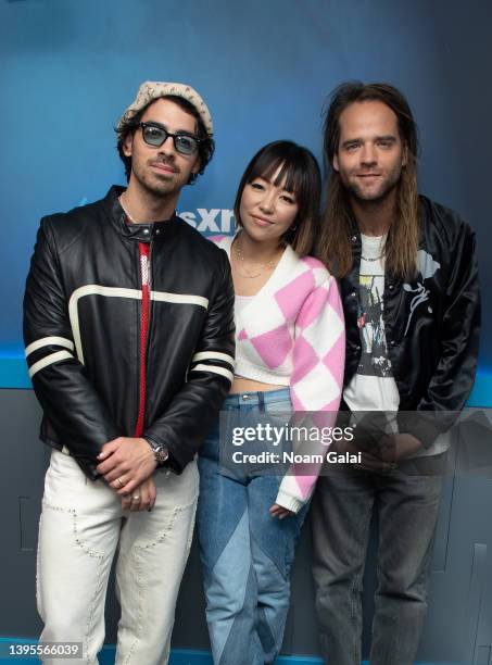 Joe Jonas, JinJoo Lee and Jack Lawless of DNCE visit the SiriusXM Studios on May 05, 2022 in New York City.