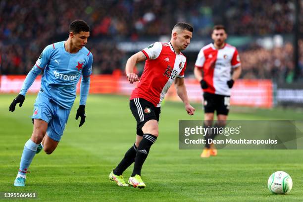 Bryan Linssen of Feyenoord battles for the ball with Alexander Bah of Slavia during the UEFA Conference League Quarter Final Leg One match between...