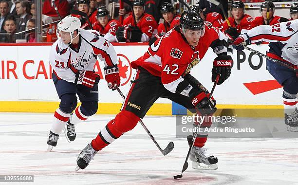 Jim O'Brien of the Ottawa Senators skates up ice with the puck against the Washington Capitals at Scotiabank Place on February 22, 2012 in Ottawa,...