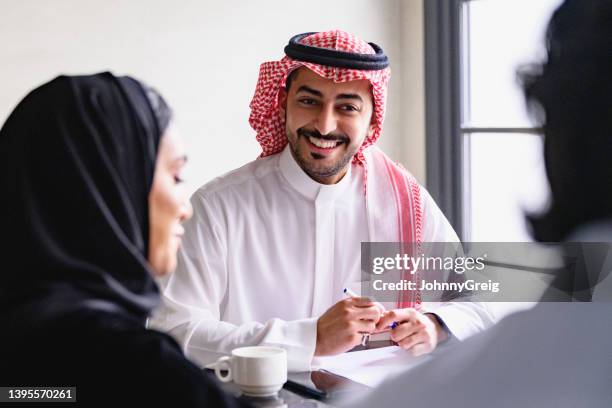 riyadh businesspeople enjoying interactive idea-sharing - saudi arabia stock pictures, royalty-free photos & images