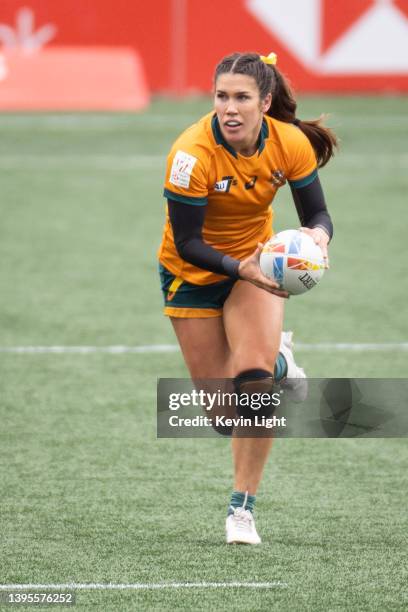 Charlotte Caslick of Australia runs with the ball versus Spain during a Women's HSBC World Rugby Sevens Series match at Starlight Stadium on April...