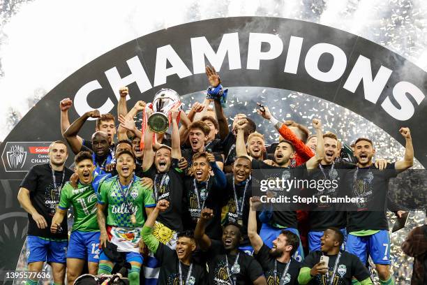 The Seattle Sounders celebrate after beating Pumas 3-0 during 2022 Scotiabank Concacaf Champions League Final Leg 2 at Lumen Field on May 04, 2022 in...