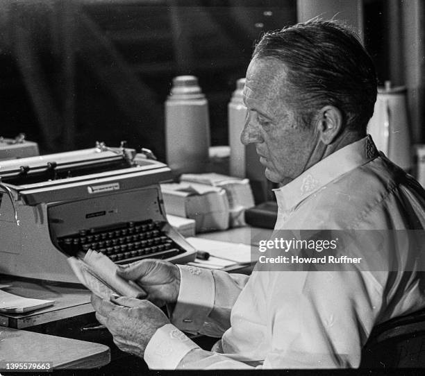 Canadian-born American media personality Art Linkletter uses a typewriter backstage at Clark Air Base, Luzon, Philippines, April 12, 1968. He was...