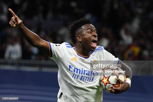 Vinicius Jr of Real Madrid CF celebrates after his team mate Rodrygo scored his team's second goal during the UEFA Champions League Semi Final Leg...