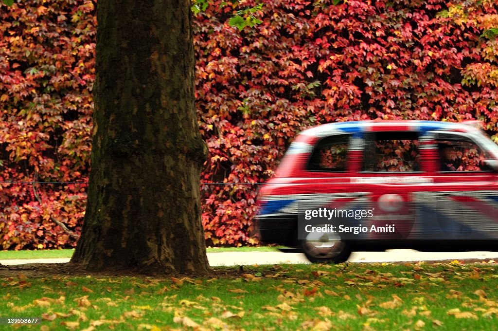 Taxi passing along Horse Guards Road