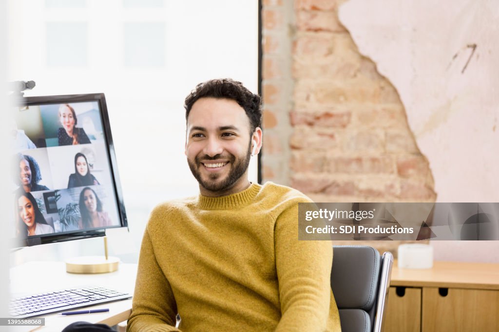 Young adult man looks away from the camera