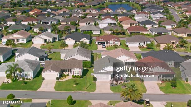 rows of houses in the villages, florida - aerial - retirement community building stock pictures, royalty-free photos & images