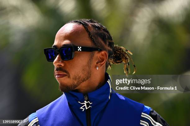 Lewis Hamilton of Great Britain and Mercedes walks in the Paddock during previews ahead of the F1 Grand Prix of Miami at the Miami International...