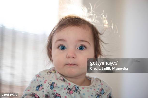 portrait of a smiling baby with pajamas - beautiful blonde babes stock pictures, royalty-free photos & images