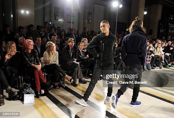 AttFazer and Jack Guinness walk the runway in front of Kate Moss, Alison Mosshart, Jo Wood, Alister Mackie, Sam Gainsbury, Grace Woodward, Zara...