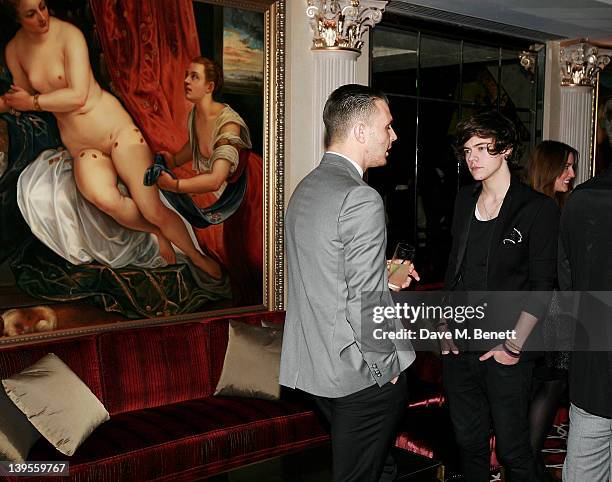 Theo Hutchcraft and Harry Styles attend a private dinner hosted by editor of British GQ Dylan Jones and Chairman of the BFC Harold Tillman to...