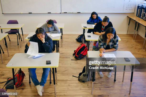 high school students in a school classroom - gymnasieexamen bildbanksfoton och bilder