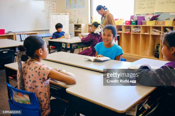 elementary age students in a classroom - indian school children stock pictures, royalty-free photos & images