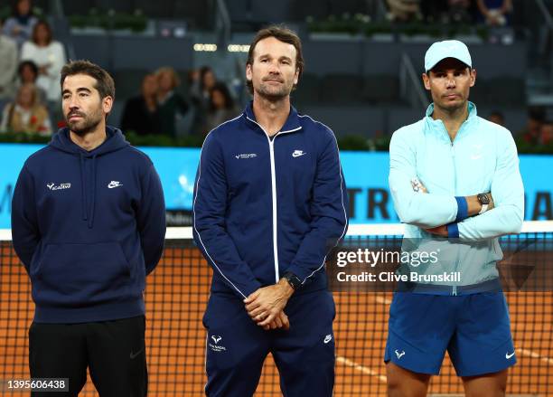 Marc Lopez of Spain, Carlos Moya and Rafael Nadal of Spain attend a presentation in honour of Manolo Santana during day seven of the Mutua Madrid...