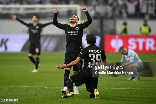 Filip Kostic and Goncalo Paciencia of Eintracht Frankfurt celebrate their sides victory in the UEFA Europa League Semi Final Leg Two match between...