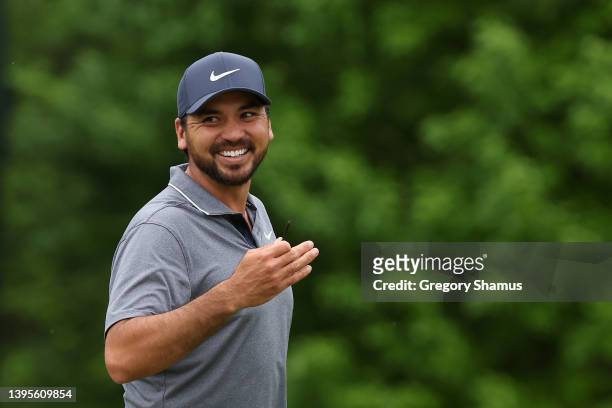 Jason Day of Australia reacts on the 18th green during the first round of the Wells Fargo Championship at TPC Potomac Clubhouse on May 05, 2022 in...